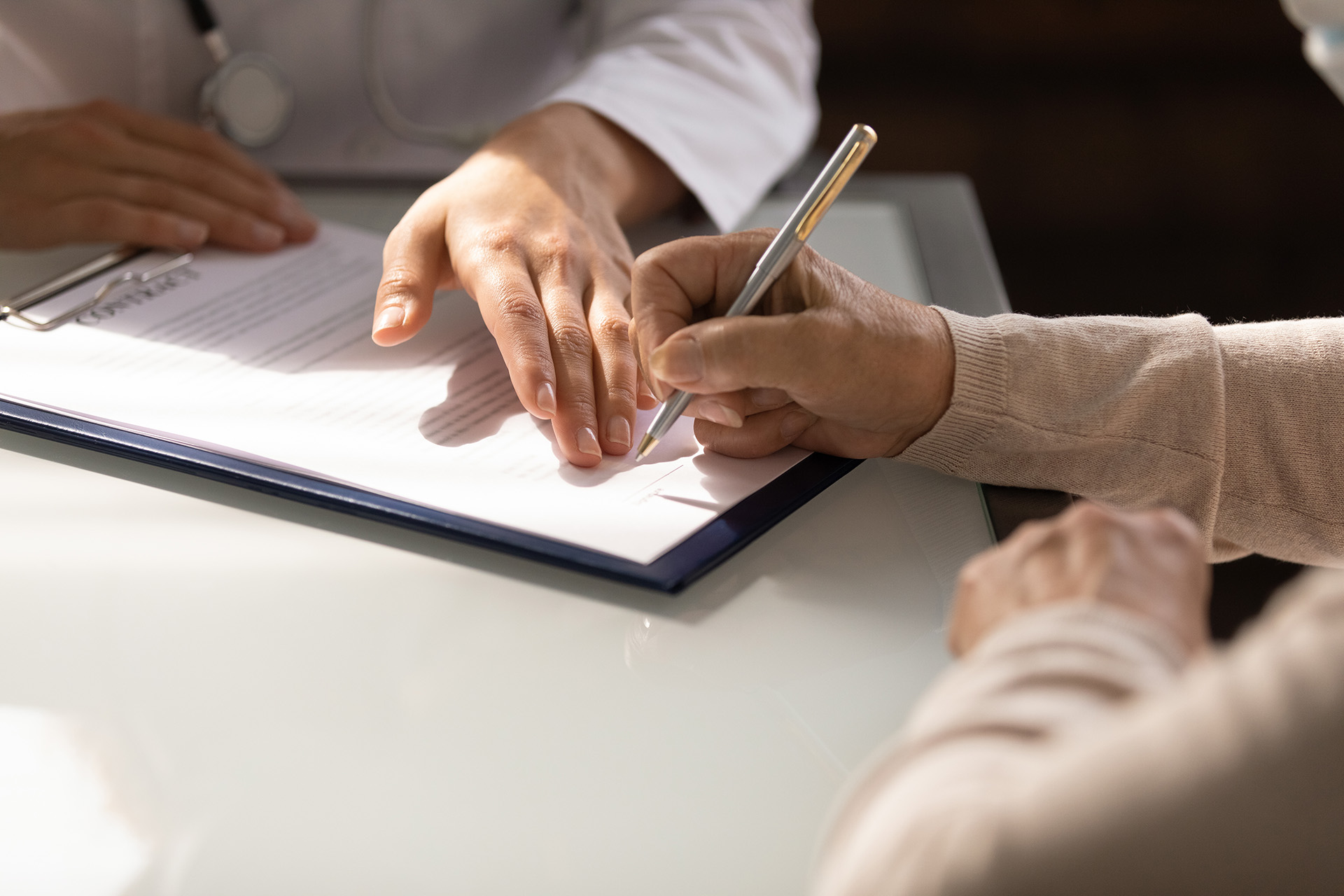 indianapolis personal injury lawyer, Photo of a Woman Signing Documents